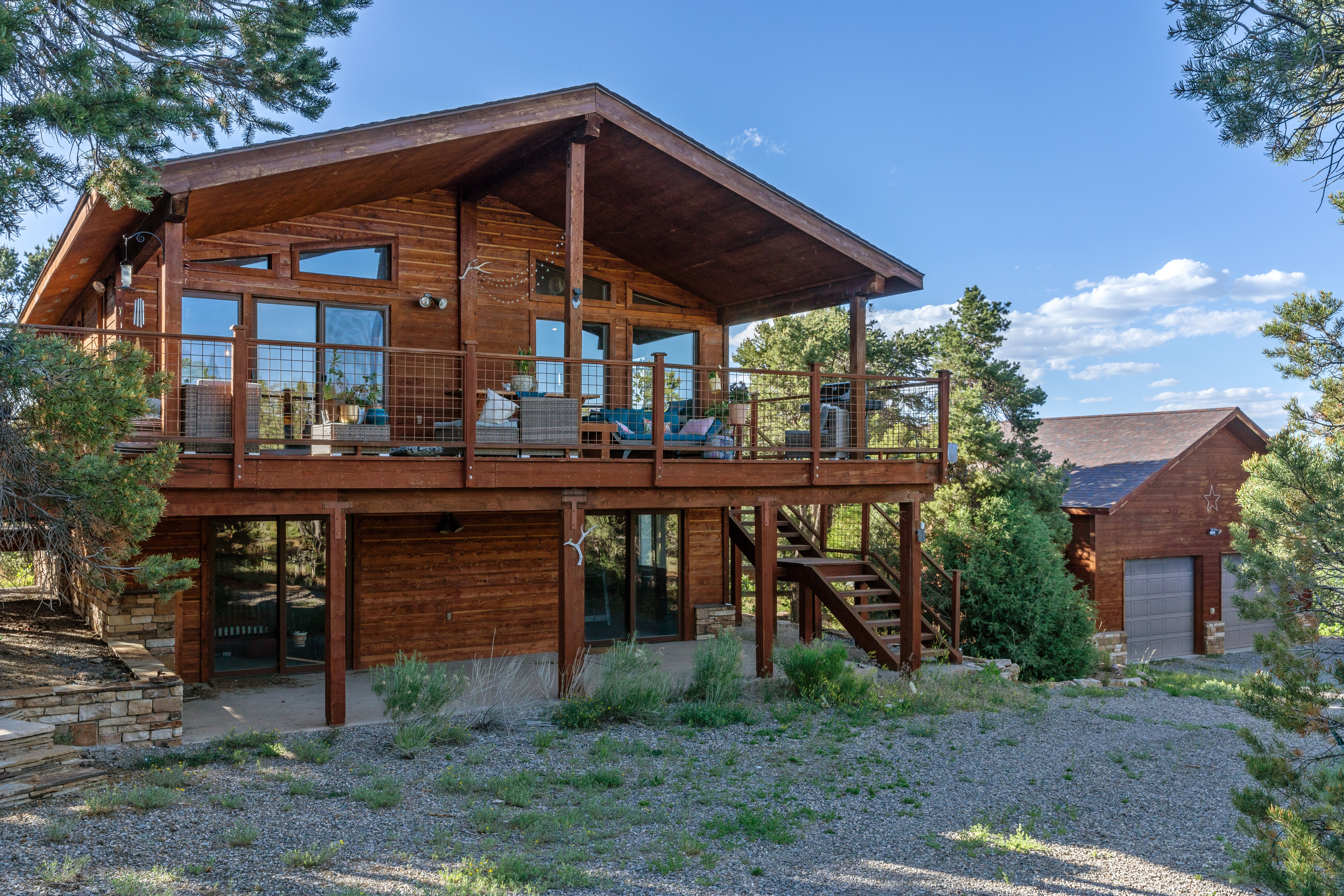 A special home in a private setting amongst the Pinon Pines and spacious 5 acres