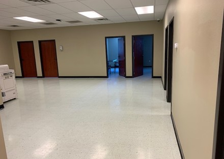 Second floor central access point with multiple offices around the perimeter